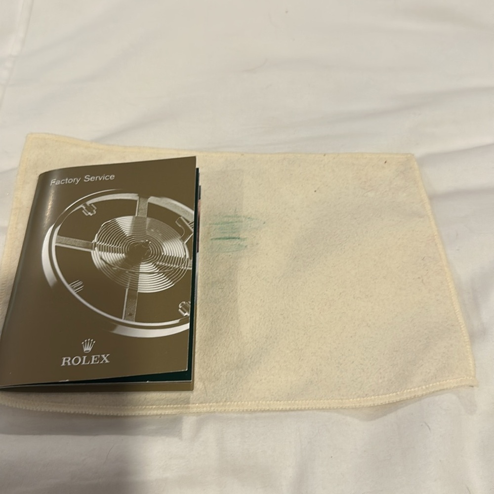 ROLEX FACTORY SERVICE BOOK AND WHITE ROLEX CLEANING CLOTH